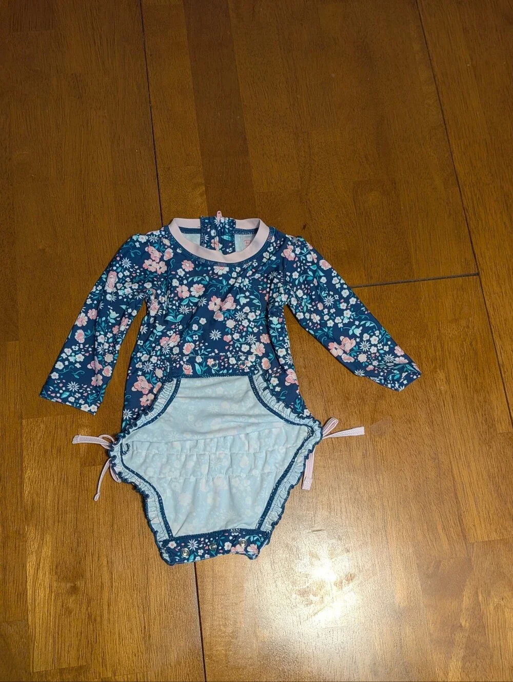 Ruffle Butts Navy Floral Long-Sleeve Swim Suit with Pink Trim